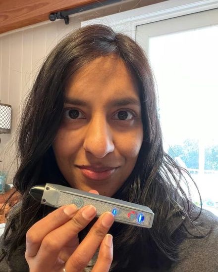 A yourTMJ Pen customer using the Pen